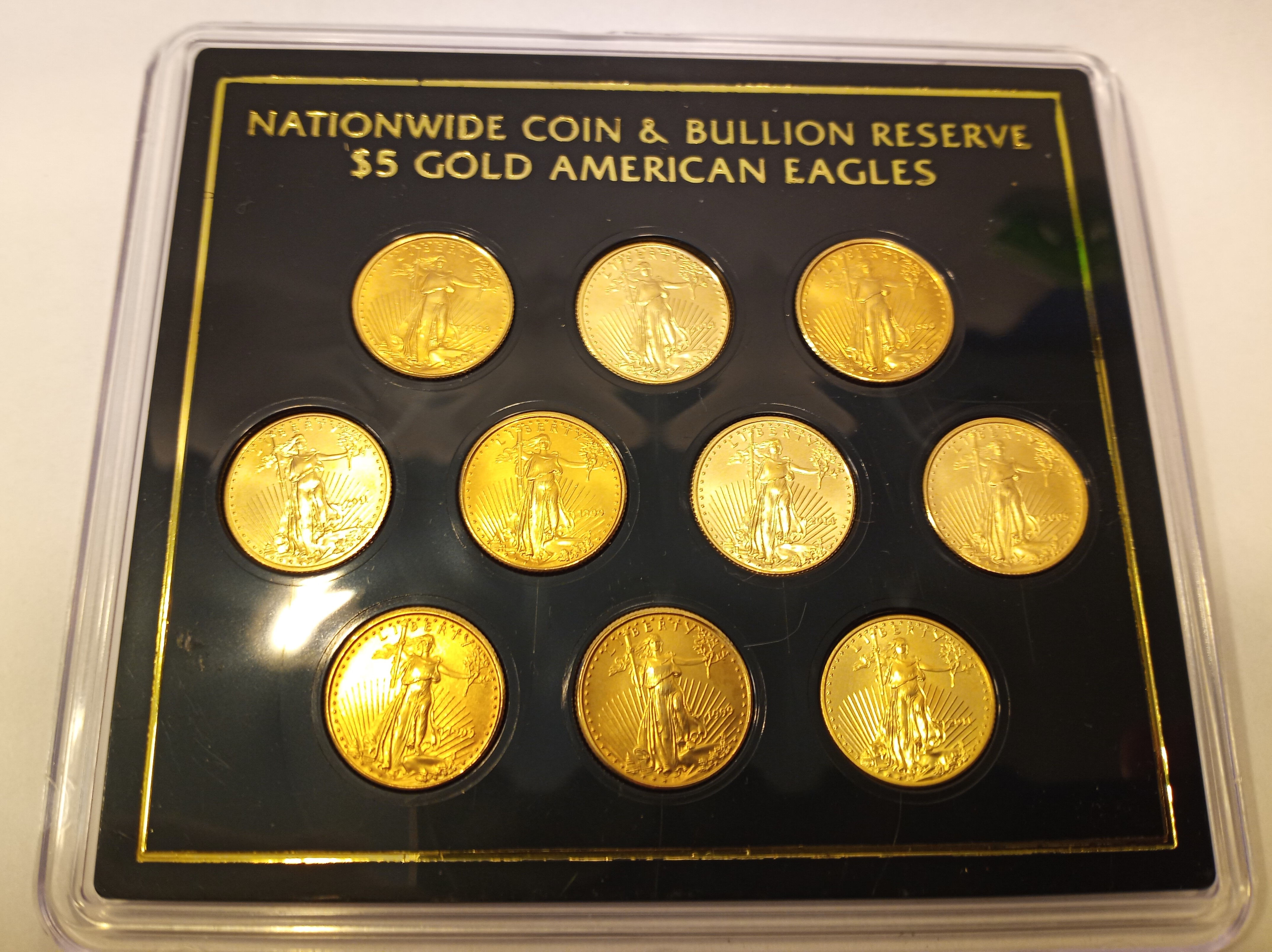 (10) 1/10 ounce Gold American Eagles in Display