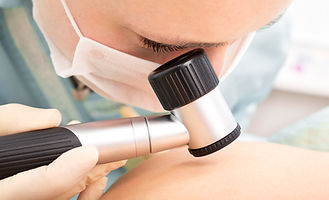 Dermatologist Examining Skin