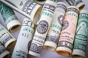 rolled-20-u-s-dollar-bill-164527.jpg