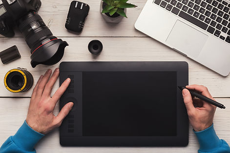 designer-hand-working-with-graphic-tablet-74UE96R.jpeg