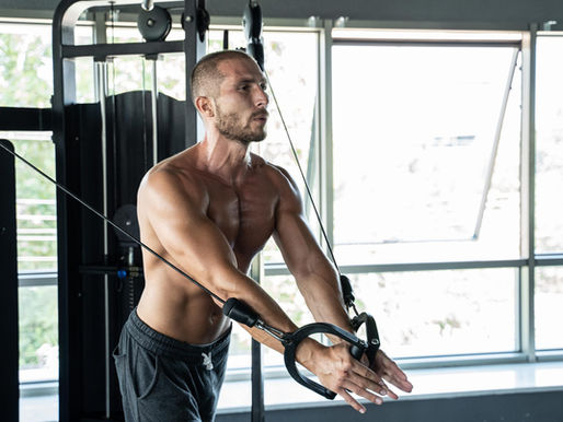 Man doing cable flyes