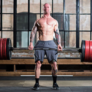 Man doing deadlifts