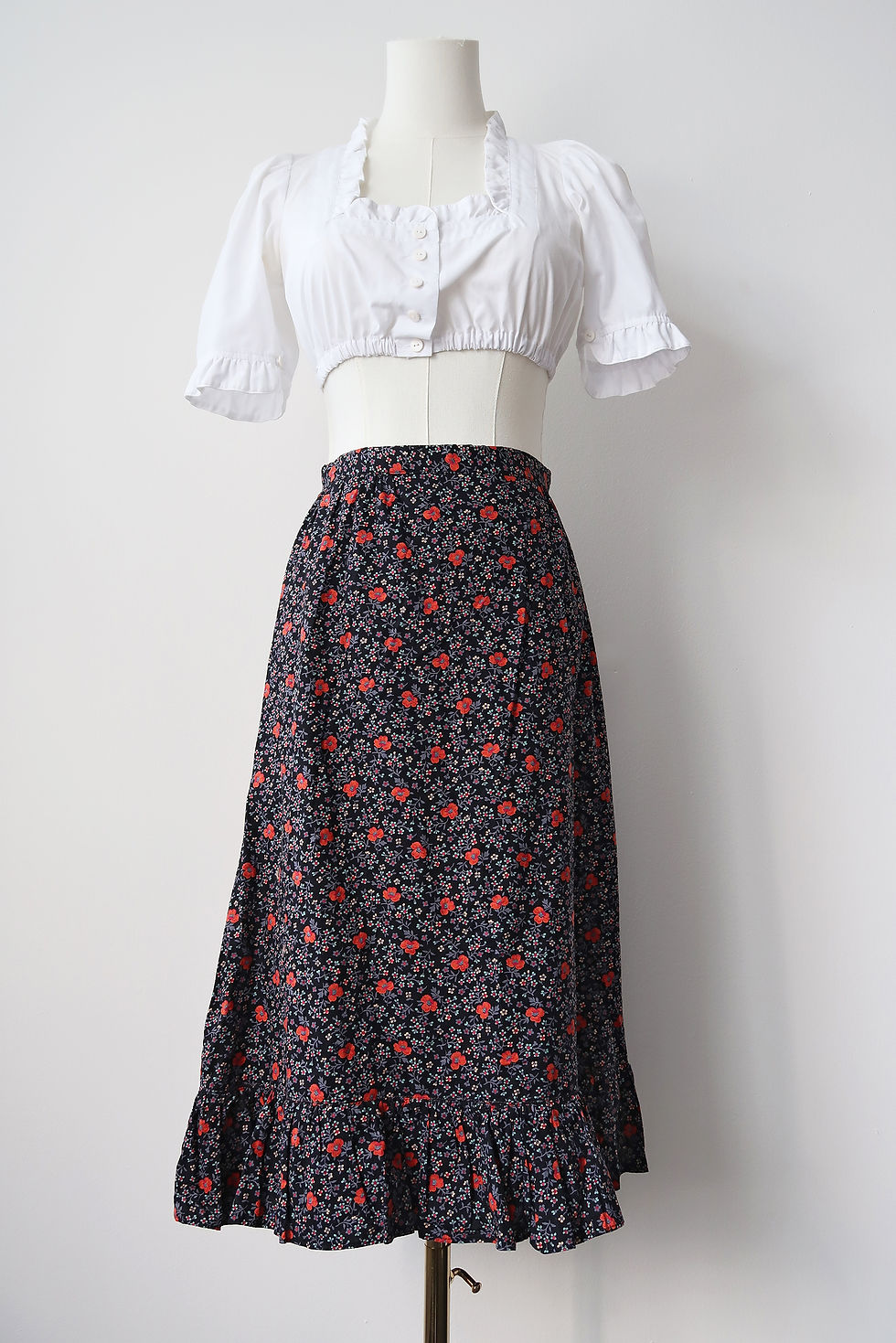 Vintage 70's milk maid floral skirt in black with frill edge trim. UK 8.