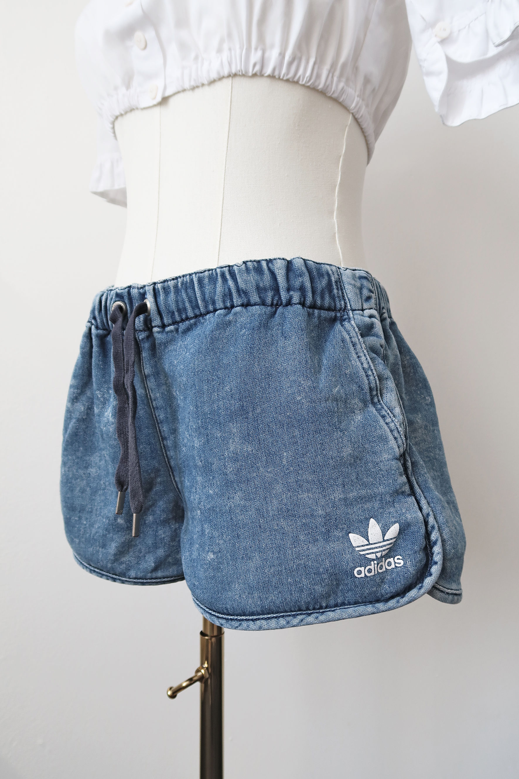 Vintage Y2K 'Adidas' blue denim wash jersey shorts. UK 12.