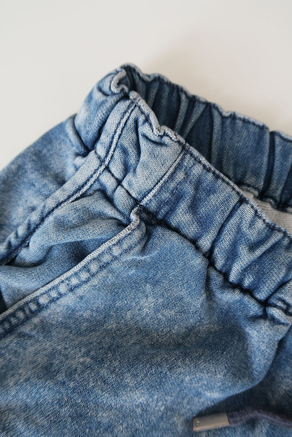 Thumbnail: Vintage Y2K 'Adidas' blue denim wash jersey shorts. UK 12.