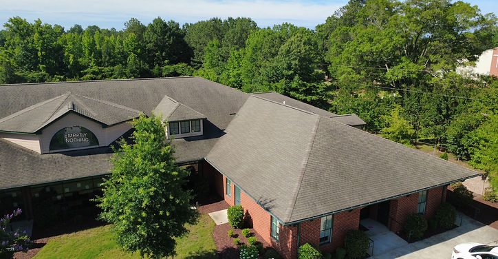 Commercial gutter cleaning project completed by JAMM Solutions LLC to restore proper water flow and improve drainage performance in Charlotte, North Carolina.
