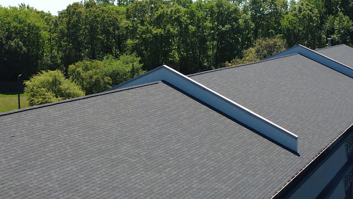 Roof inspection photo showing asphalt shingle roofing system in Charlotte, North Carolina.