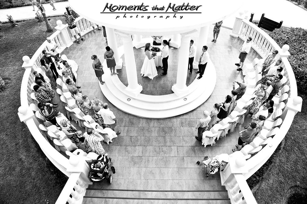 Wide view of Charmaine and Aidan’s Barcelo Maya Palace wedding ceremony
