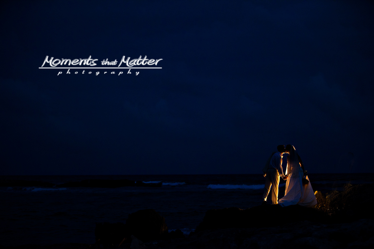 Night ocean portrait of a wedding couple in the Riviera Maya