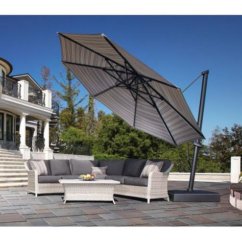 Add a umbrella to your outdoor setting to enjoy a chilling drink in the sun .....
