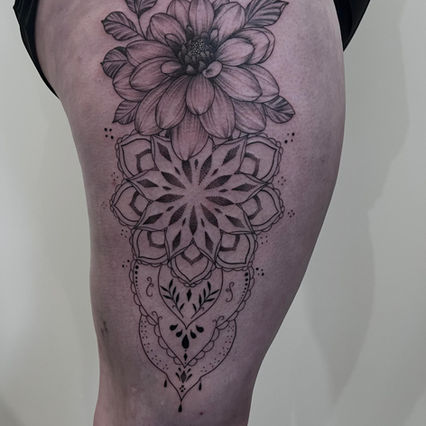 mandala tattoo thigh tattoo black and grey tattoo blackwork tattoo ornamental tattoo yyc tattoo calgary tattoo dahlia tattoo tattoo artist 