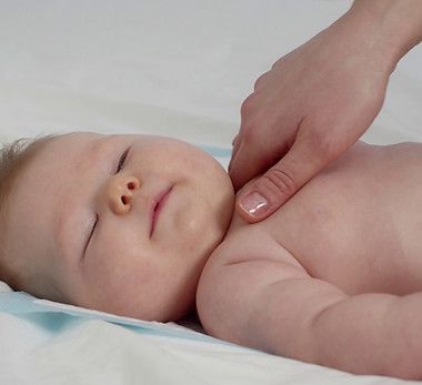 baby-massage-caring-mother-gently-massaging-her-newborn-child-skin-SBI-350687102.jpg