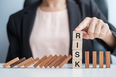 Businesswoman hand Stopping Falling wooden Blocks or Dominoes. Business, Risk Management,