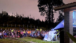 Premiere film Jesus shown outside with a projector