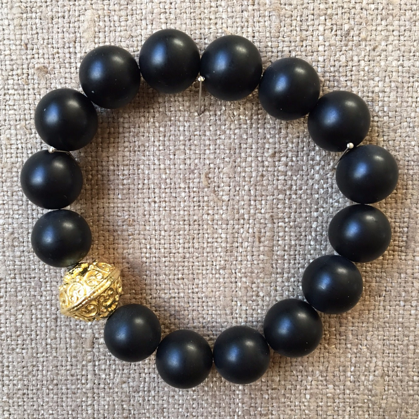 Matte onyx and gold bracelet