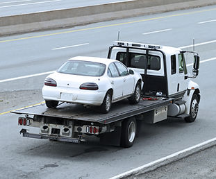 Repossessed vehicle on a tow truck