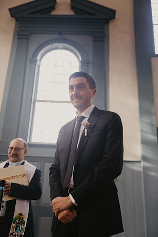 A groom looking into the audience