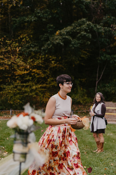 A bridesmaid walking