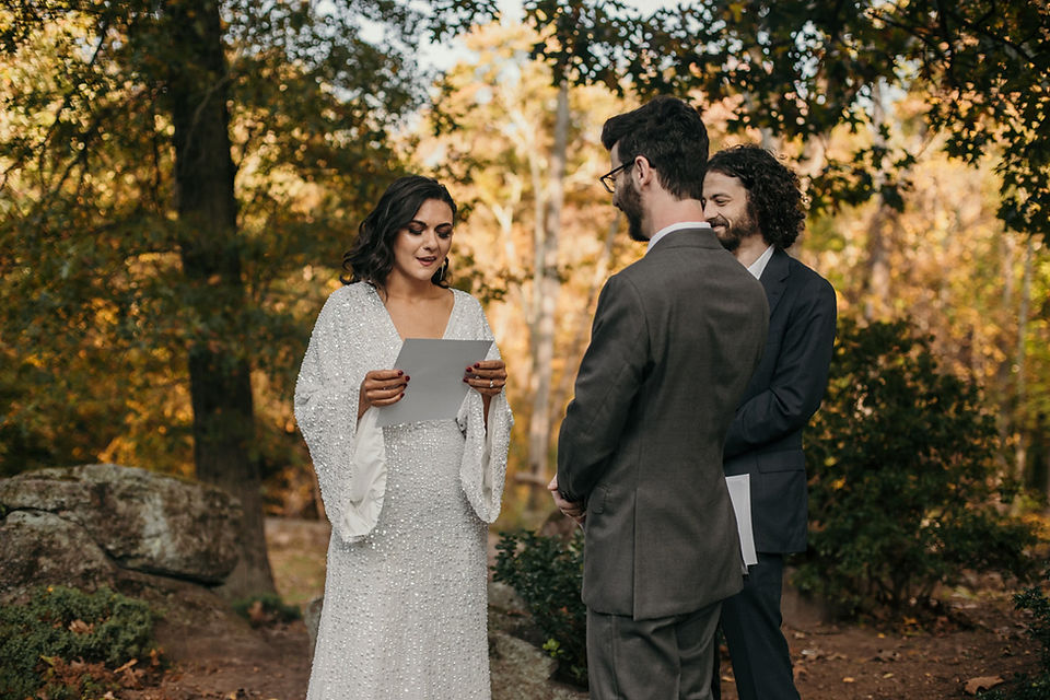 A couple reading their vows