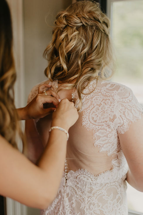 Allie getting her dress pinned up