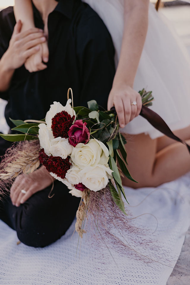 A bride holding flowers