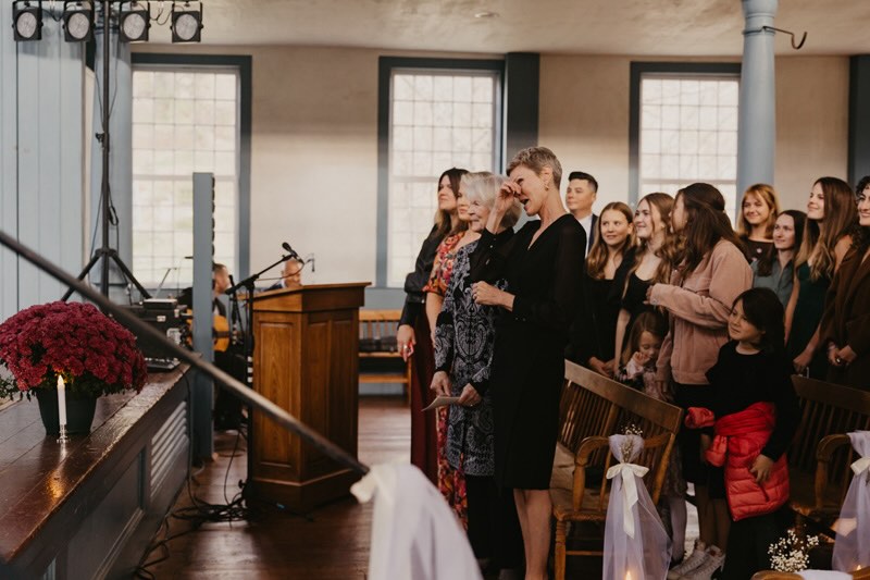Guests crying at a wedding