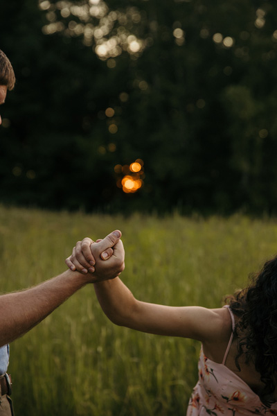 An image of hands clasped