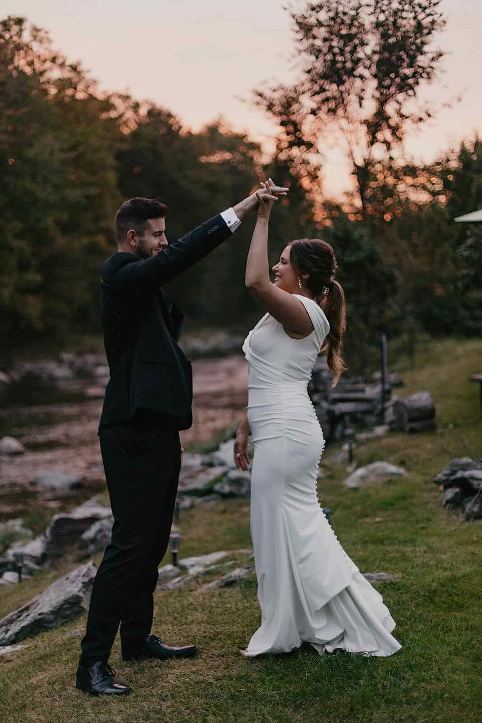 A couple dancing at sunset