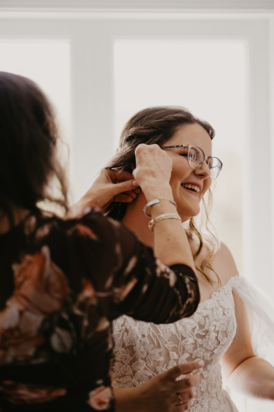 A mother helping her daughter