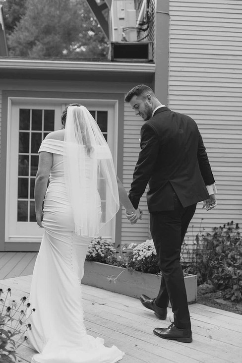 A couple walking in black and white