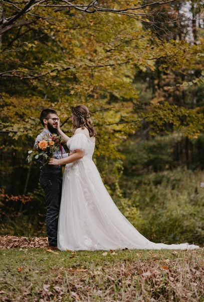 A bride and groom embracing