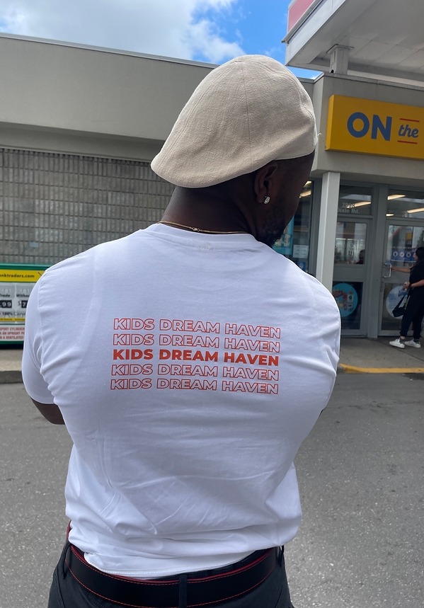 Person wearing Kids Dream Haven shirt