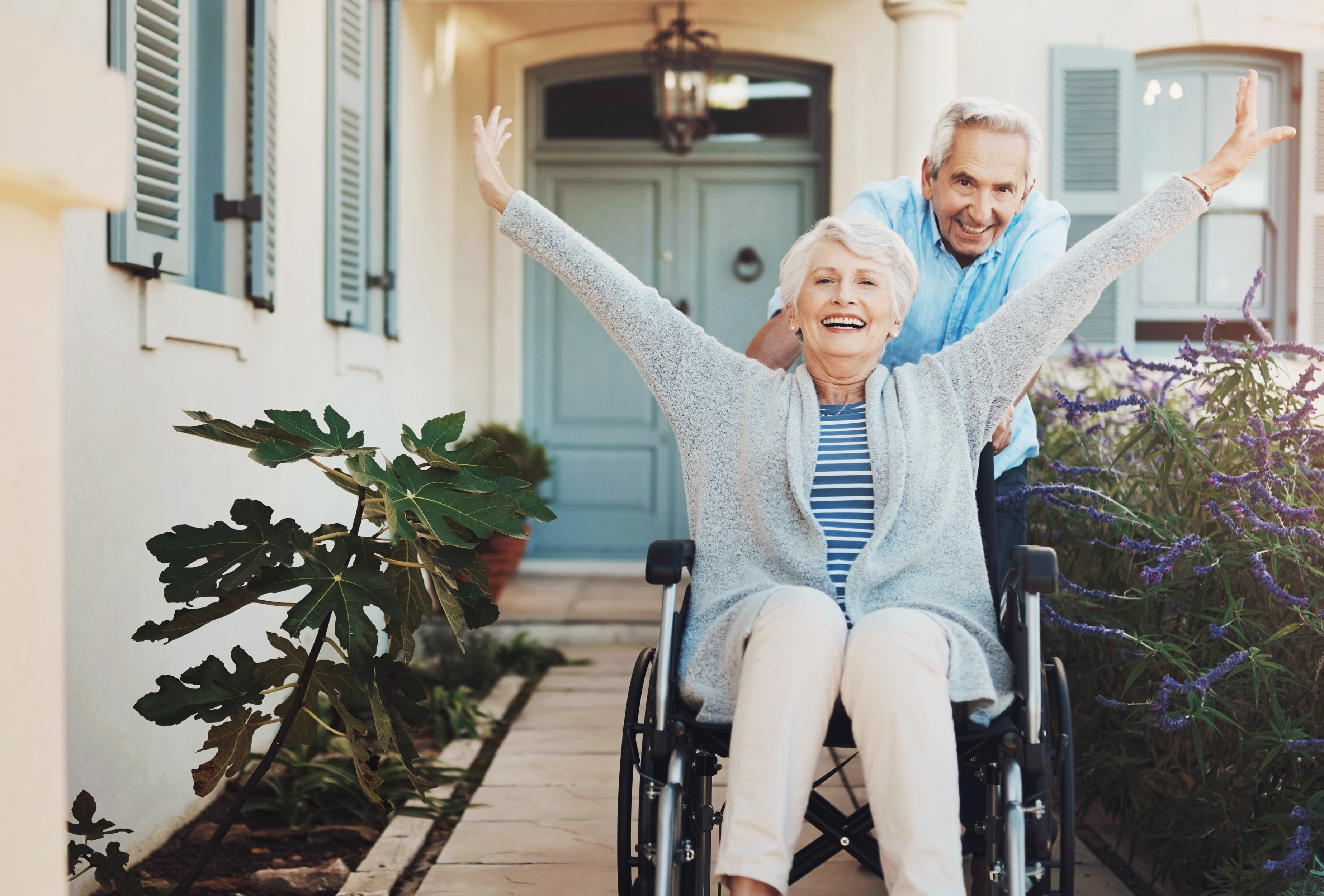senior-couple-wheelchair-smile-celebration-fun-woman-with-disability-outside-freedom-husba