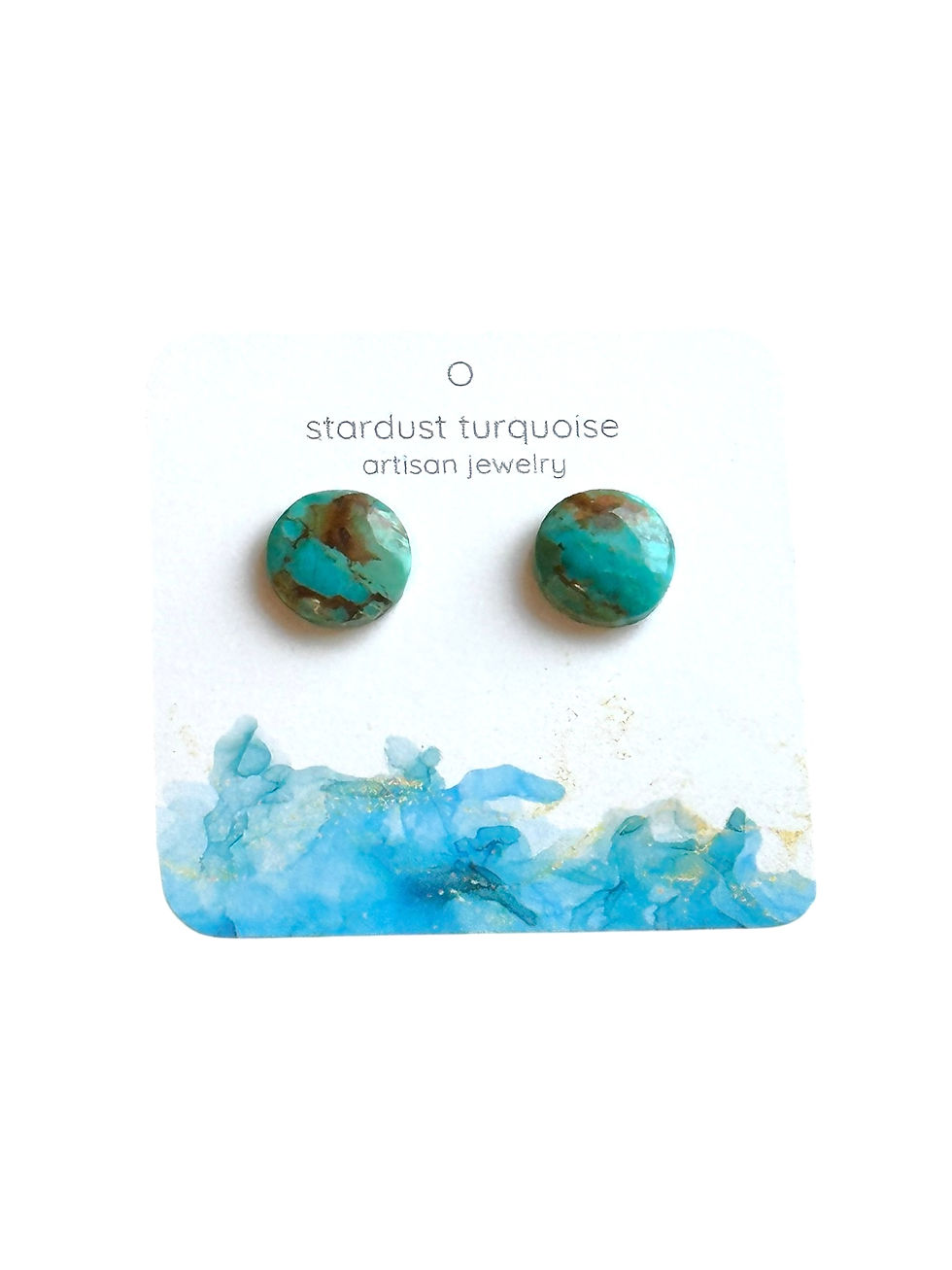 A pair of round turquoise stud earrings with brown veining on a decorative earring card.