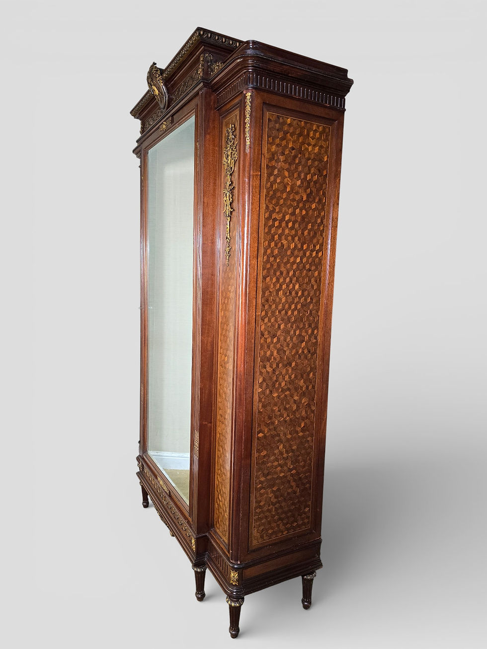 Thumbnail: A Louis XVI Revival Gilt Mounted Mahogany and  Block Parquetry Armoire Wardrobe