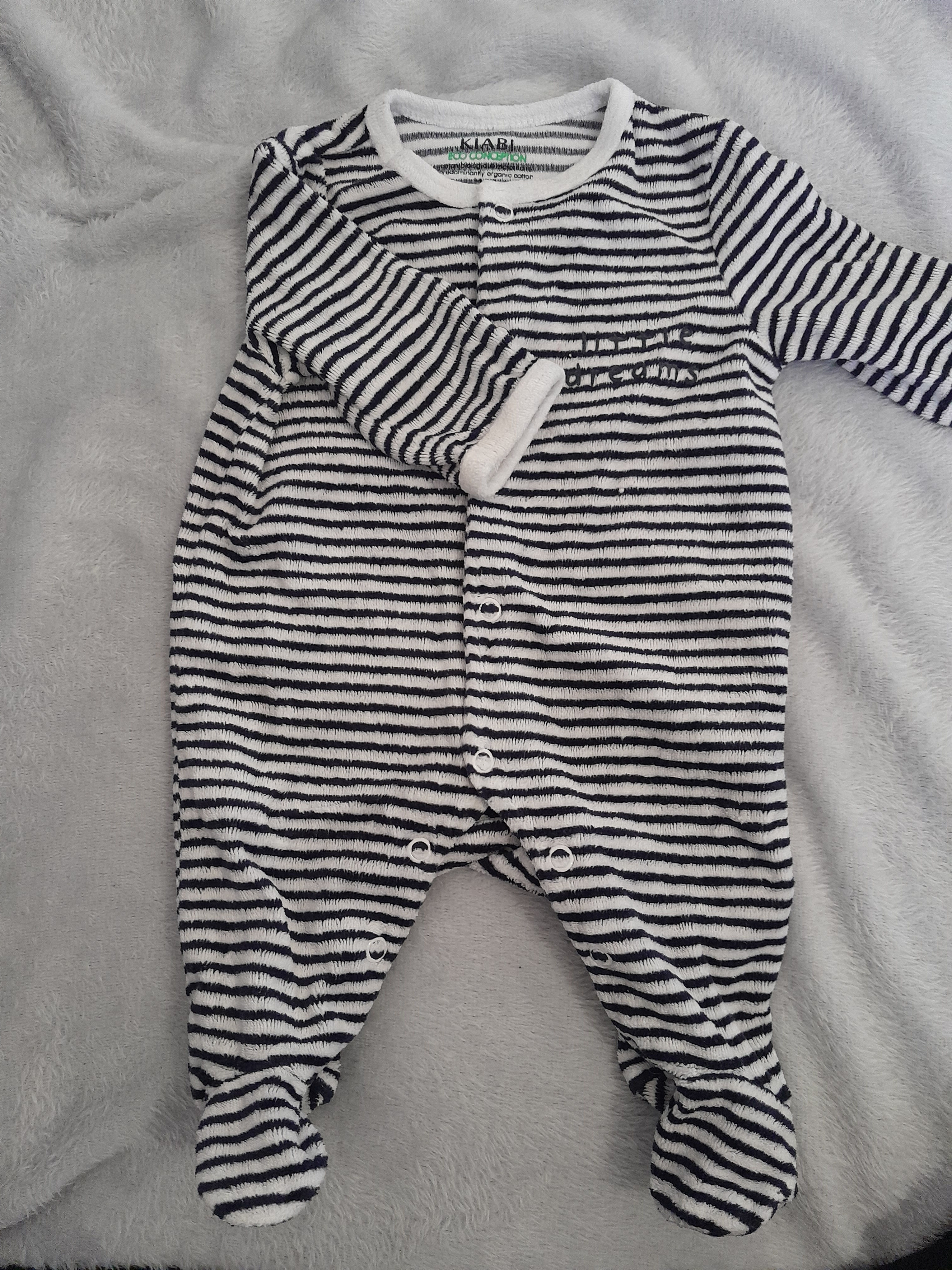 Barboteuse rayée noire et blanche, seconde main, pour bébé, à boutons.