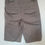 Miniature : Short gris vue arrière, poches visibles sur un cintre, prêt à porter. Seconde Main.