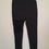 Miniature : Pantalon noir avec détail sur le côté, sur un fond blanc. Seconde main.