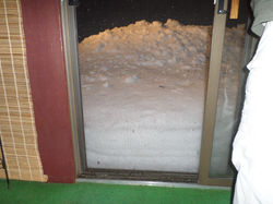 Snow bank at the door