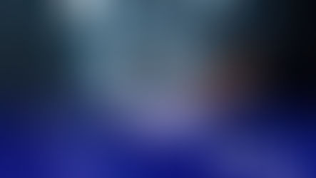 A financial planner using a tablet displaying a digital pattern.