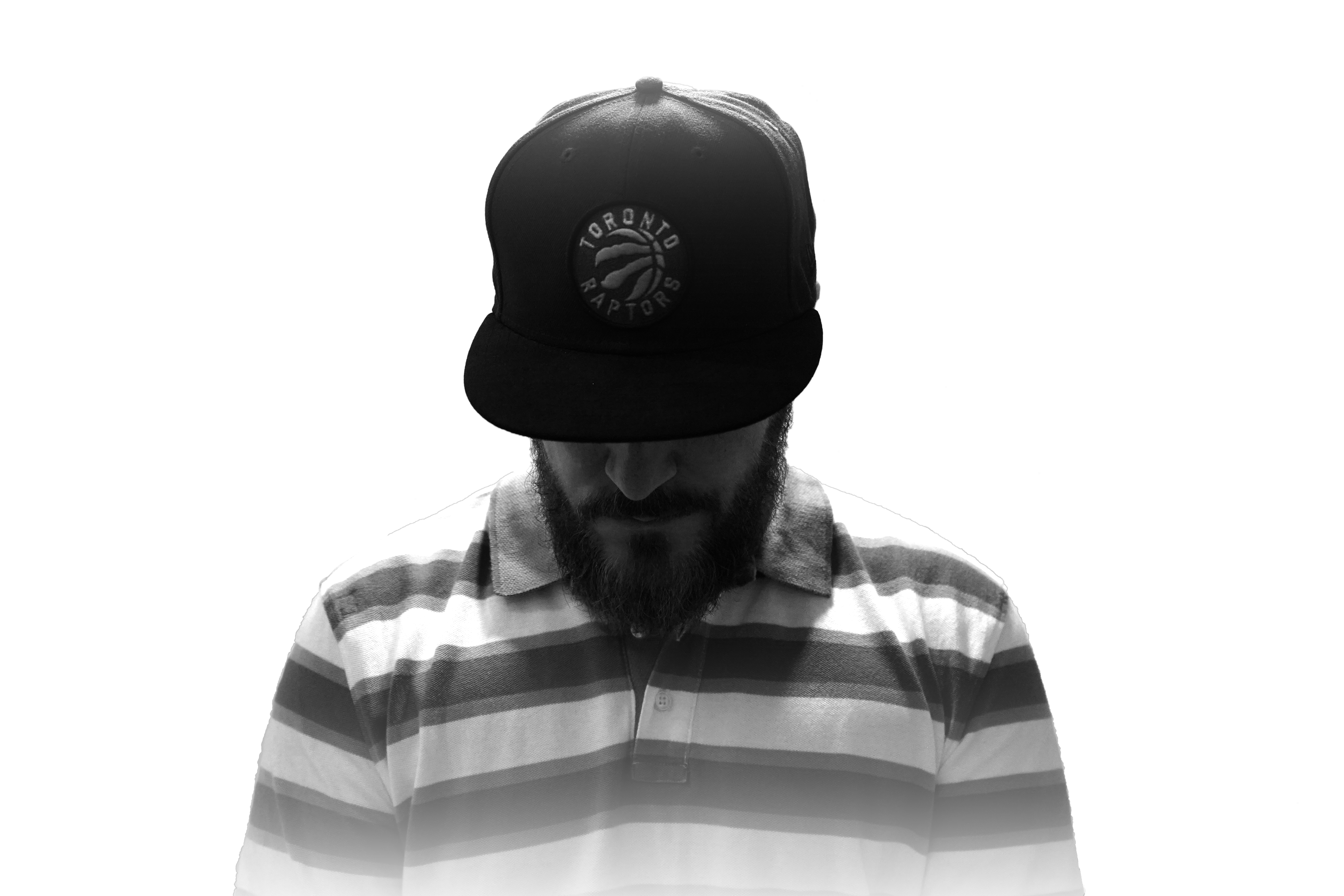 Rel McCoy in Raptors cap, black and white