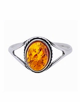 Oval cognac amber ring set in sterling silver band, size 8.