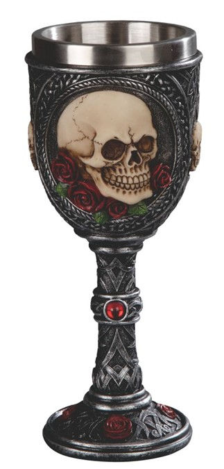 Decorative skull goblet with detailed stem and base, approximately 7 1/2 inches tall.