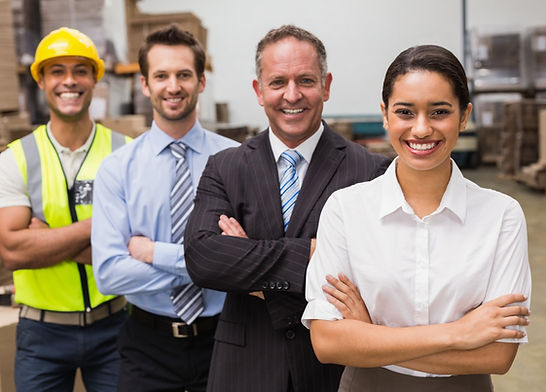 warehouse-team-smiling-camera.jpg