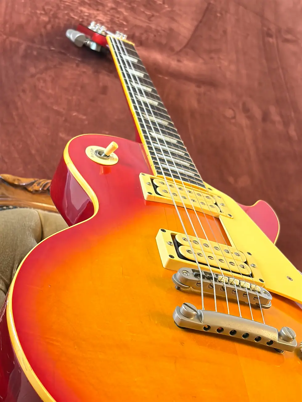 Thumbnail: Angled view of the pickups, bridge and control knobs on a 1979 Greco EG-800 Standard electric guitar
