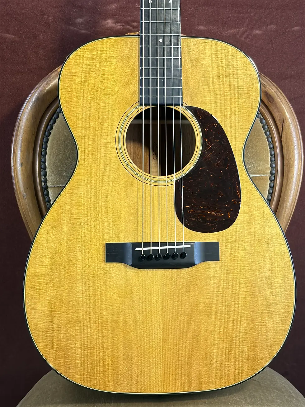 Close-up of the Martin 00-18’s solid Sitka spruce top and ebony bridge