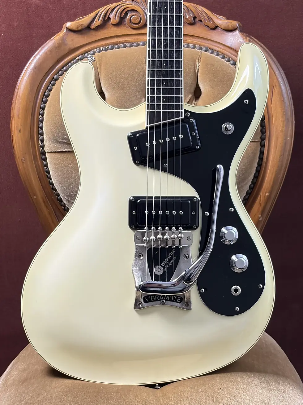 Thumbnail: Close-up of the Mosrite body showing the black-cover pickups, Vibramute vibrato and roller-saddle bridge