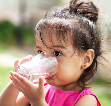 Girl Drinking Water_AdobeStock_249043117.jpeg