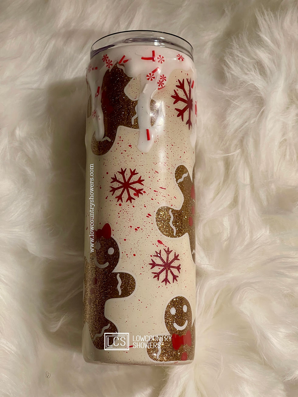 Christmas tumbler featuring glitter gingerbread cookies, faux icing drips, candy canes, peppermint sprinkles