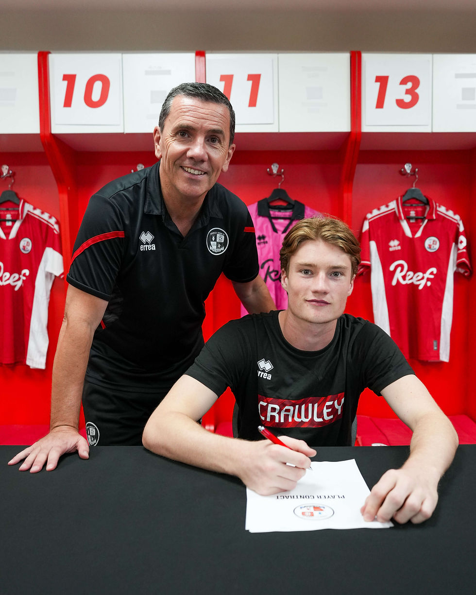 Will & Head of Foundation Darren Ford (L) signs his professional contract with Crawley Town FC